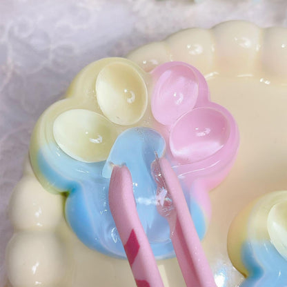 Three-color rainbow cat paw squeeze toy