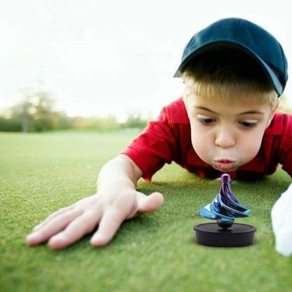 decompression pneumatic air spinning top